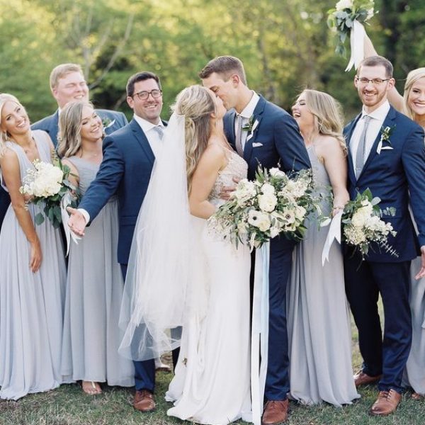 Light blue dresses & navy blue suit with light blue tie