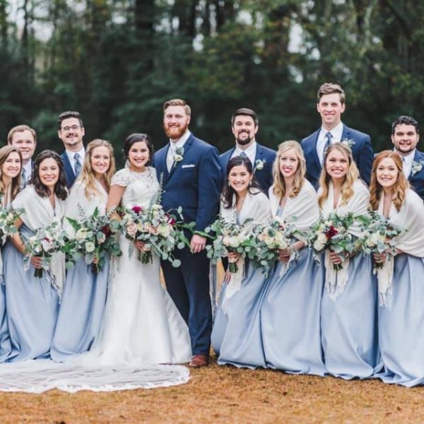 Light blue dresses & navy blue suit with light blue tie